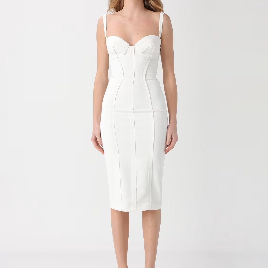 White sleeveless knee length sheath dress
